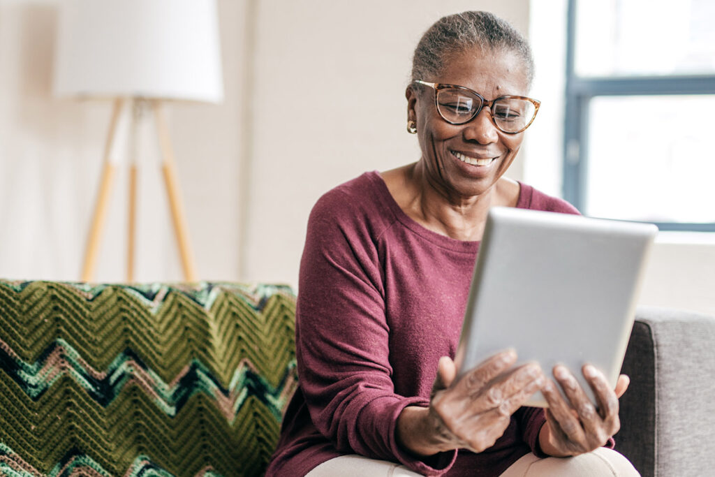woman looking at ipad